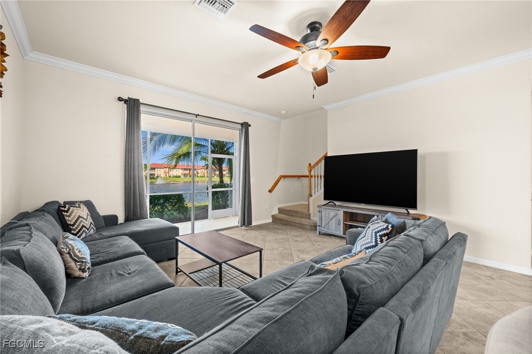 10173 Via Colomba Circle Fort Myers, FL 33966 - Photo 18 of 50 a living room with furniture and a flat screen tv