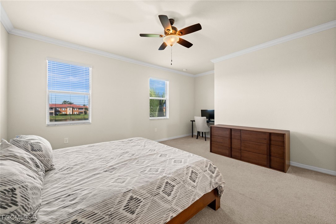 10173 Via Colomba Circle Fort Myers, FL 33966 - Photo 25 of 50 a bedroom with a bed and a dresser