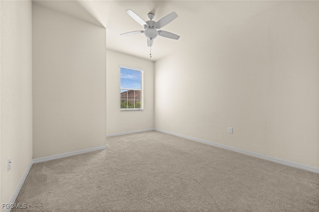 10173 Via Colomba Circle Fort Myers, FL 33966 - Photo 28 of 50 an empty room with a fan & a window