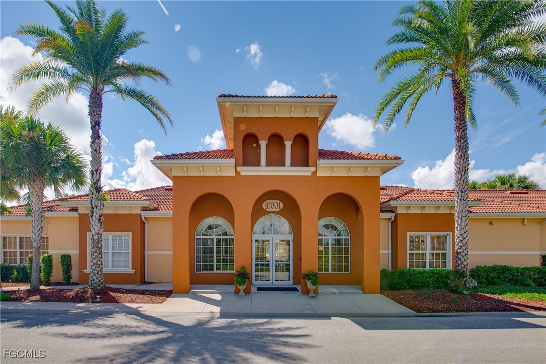 10173 Via Colomba Circle Fort Myers, FL 33966 - Photo 39 of 50 a front view of a house with garden