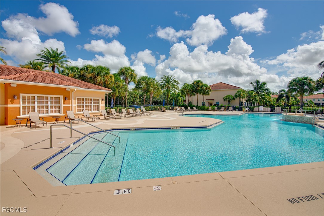 10173 Via Colomba Circle Fort Myers, FL 33966 - Photo 45 of 50 a view of a swimming pool with a yard