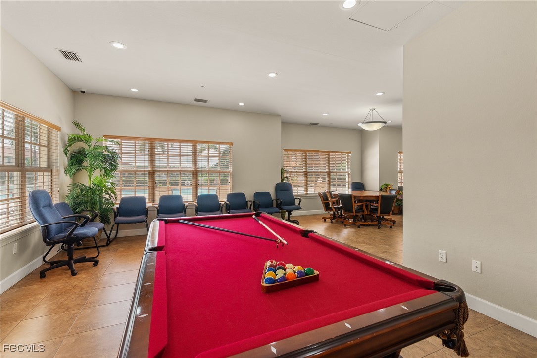10173 Via Colomba Circle Fort Myers, FL 33966 - Photo 47 of 50 a room with furniture pool table and a potted plant