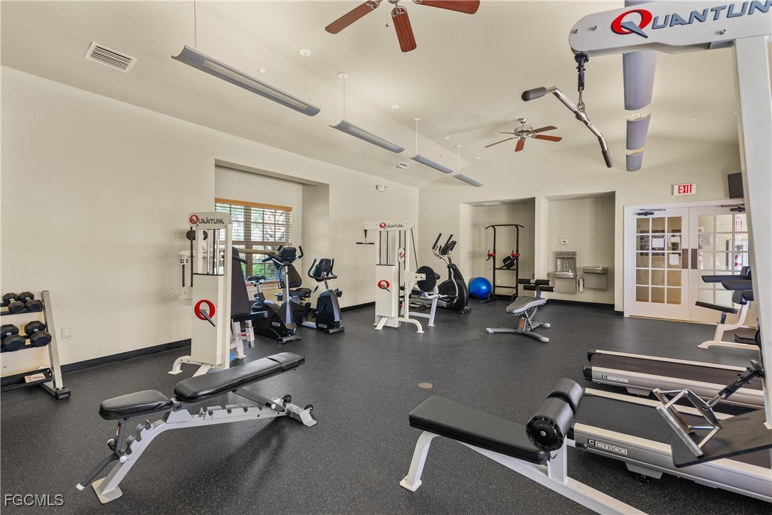 10173 Via Colomba Circle Fort Myers, FL 33966 - Photo 49 of 50 a room with gym equipment and windows