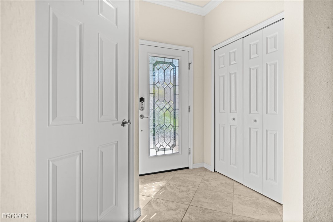 10173 Via Colomba Circle Fort Myers, FL 33966 - Photo 6 of 50 a view of an entryway with wooden floor