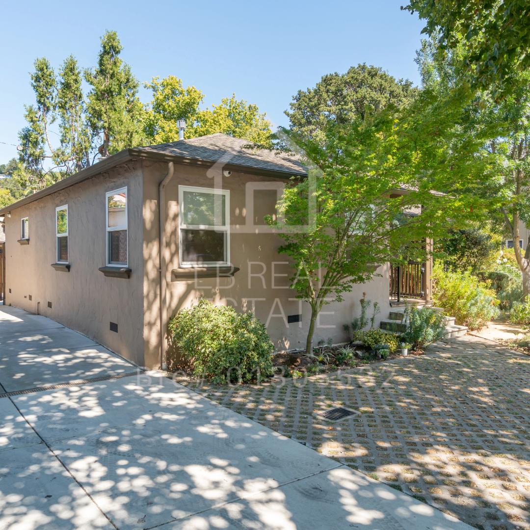 1382 Sir Francis Drake Boulevard San Anselmo, CA 94960 - Photo 14 of 16 a front view of a house with garden