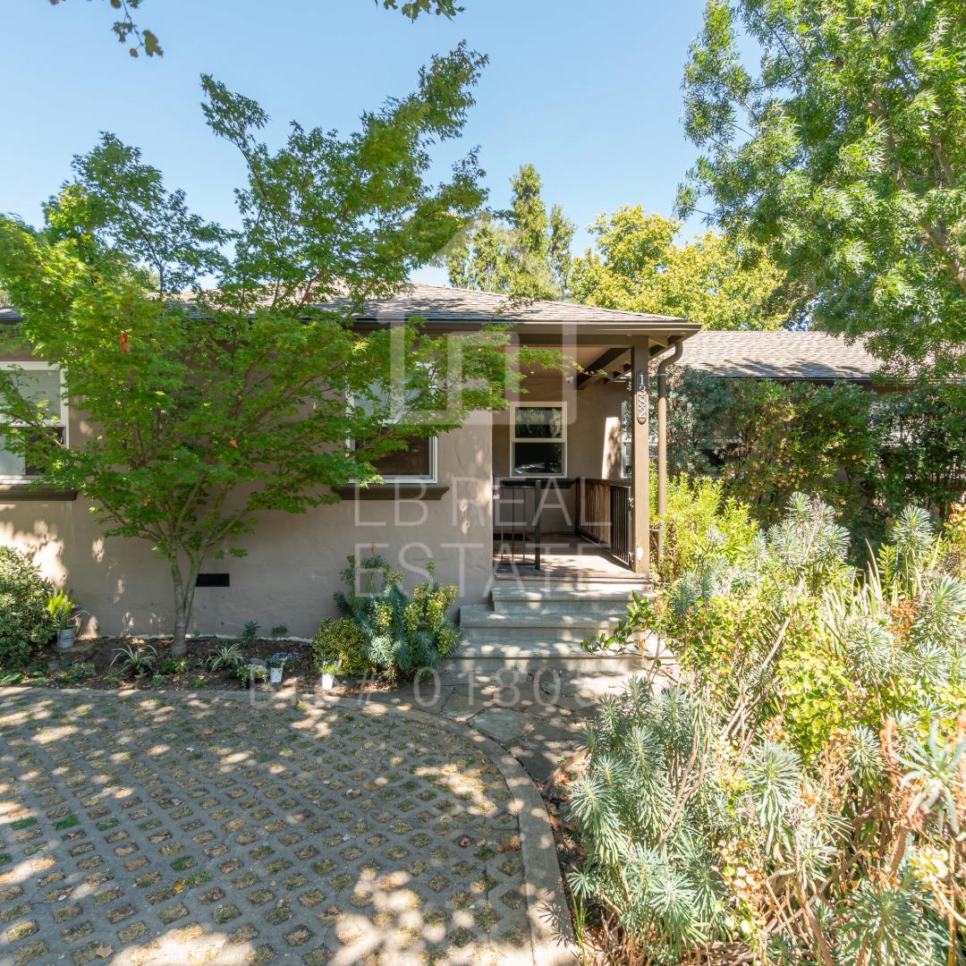 1382 Sir Francis Drake Boulevard San Anselmo, CA 94960 - Photo 15 of 16 a view of a patio with table and chairs and potted plants