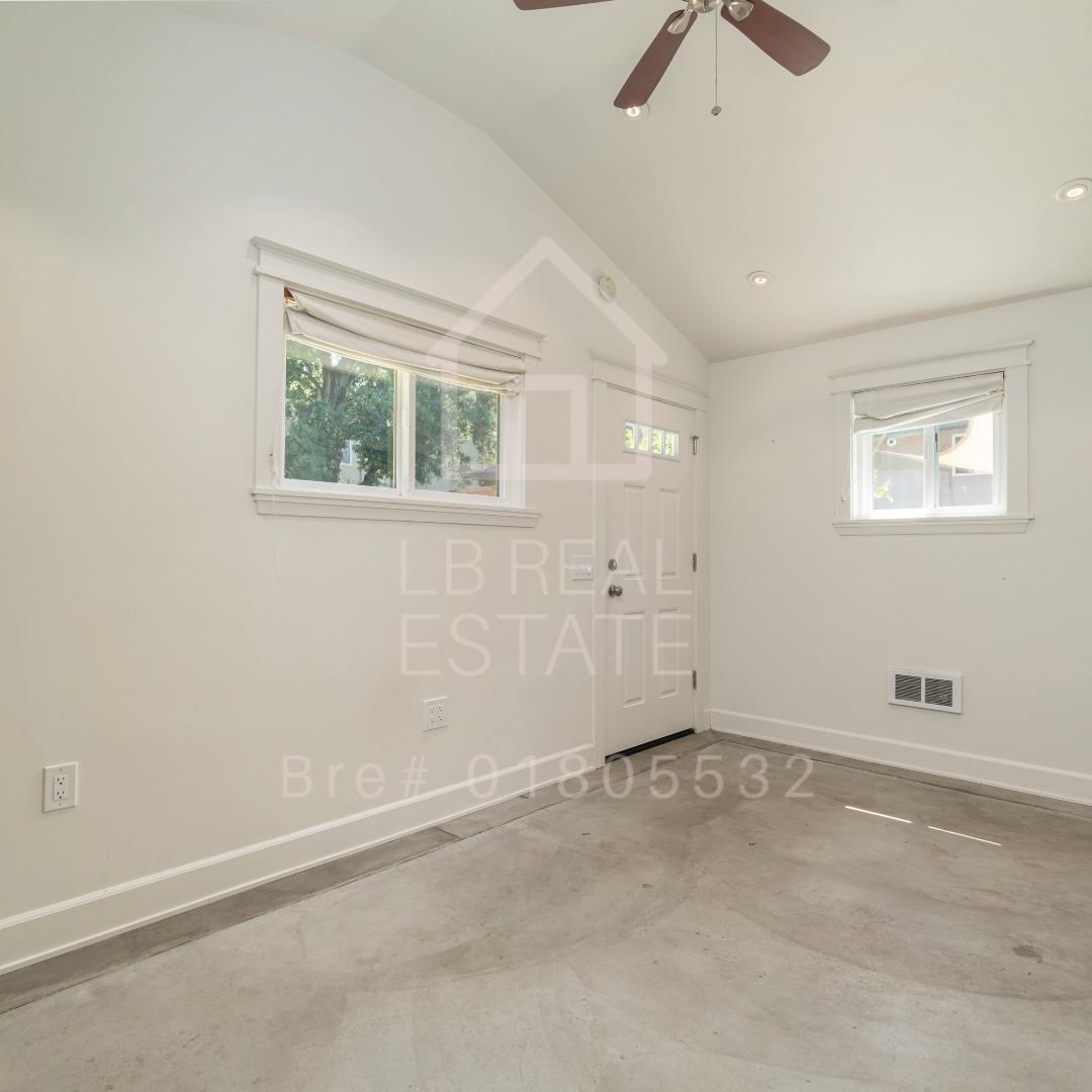 1382 Sir Francis Drake Boulevard San Anselmo, CA 94960 - Photo 16 of 16 an empty room with windows