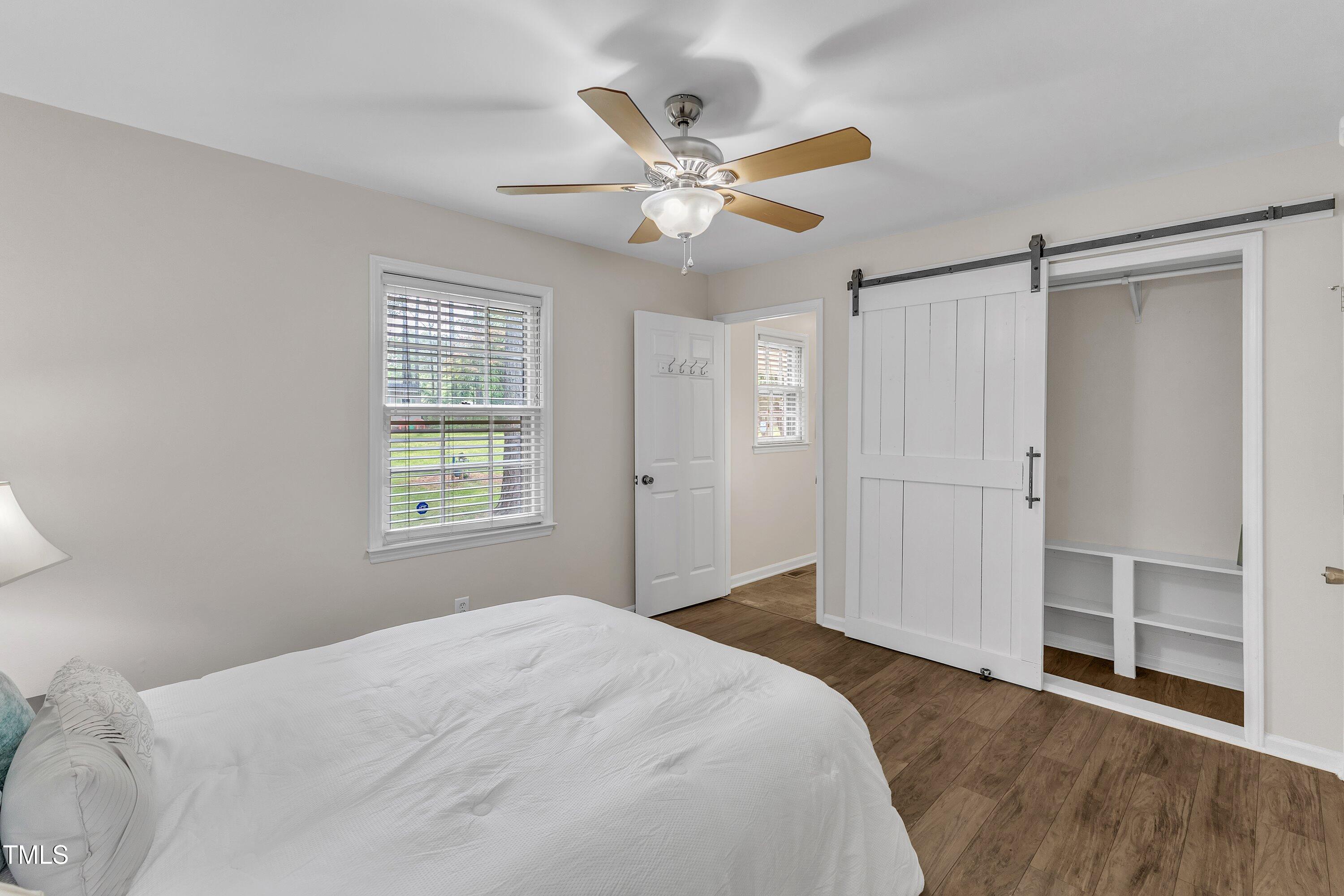 1703 Cranston Road Garner, NC 27529 - Photo 23 of 35 a bedroom with a bed and a window