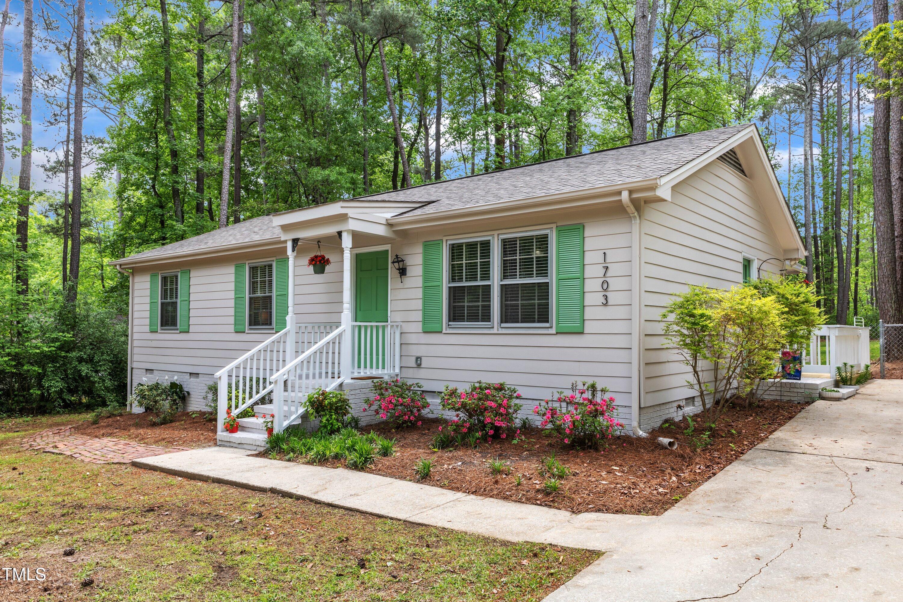 1703 Cranston Road Garner, NC 27529 - Photo 2 of 35 a view of a house with a yard