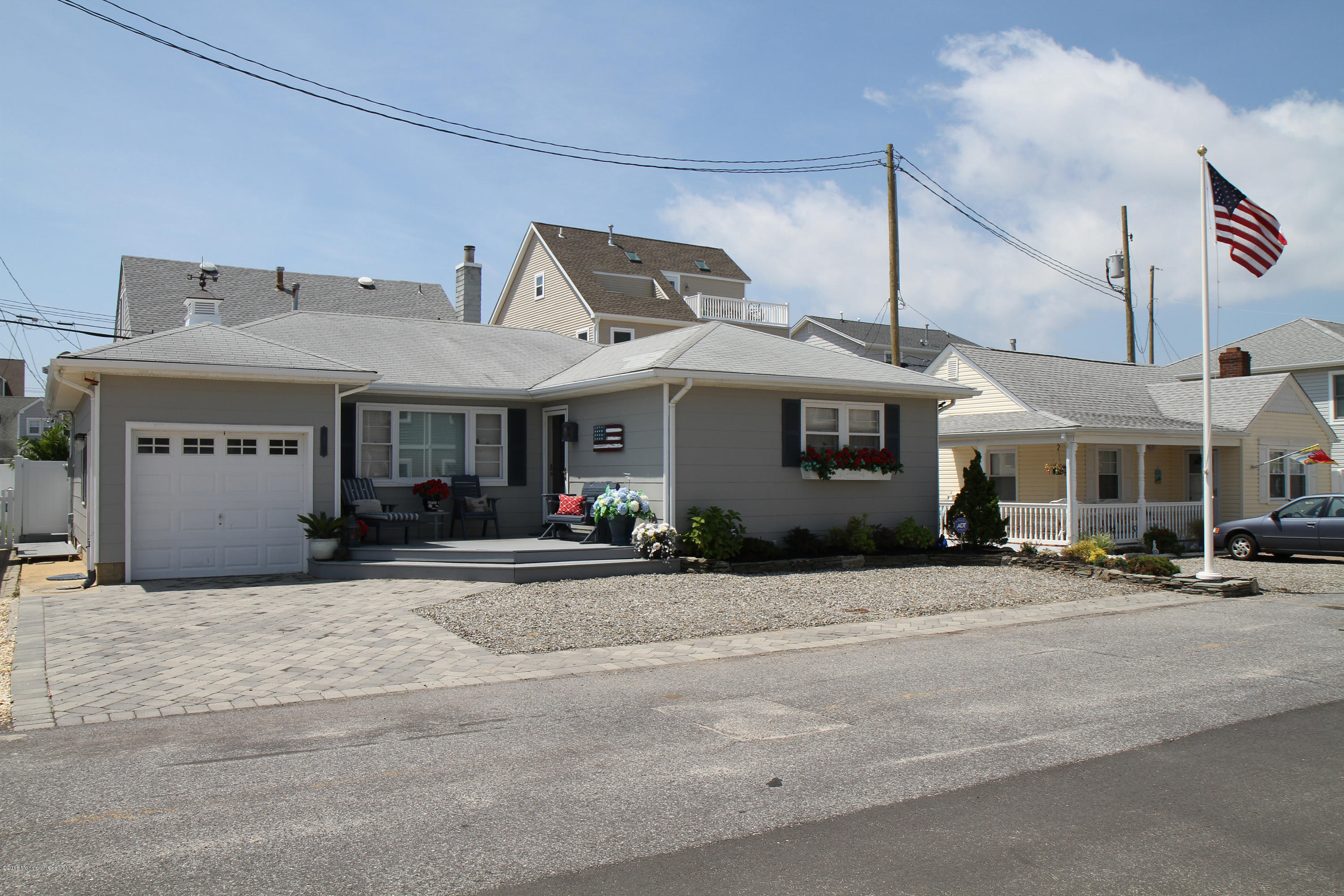 37 Silver Beach Road Lavallette, NJ 08735 - Photo 1 of 33 a front view of a building with street