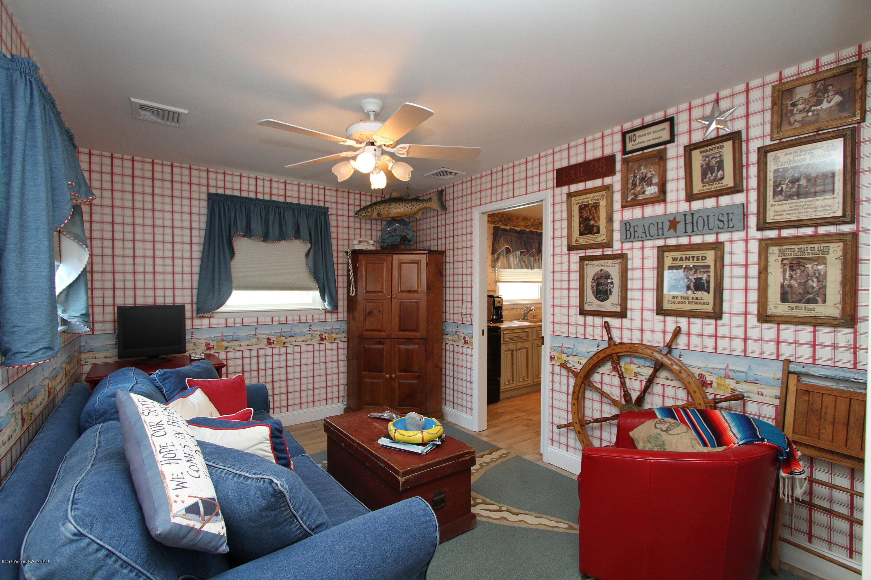 37 Silver Beach Road Lavallette, NJ 08735 - Photo 16 of 33 a living room with fireplace furniture and a wooden floor
