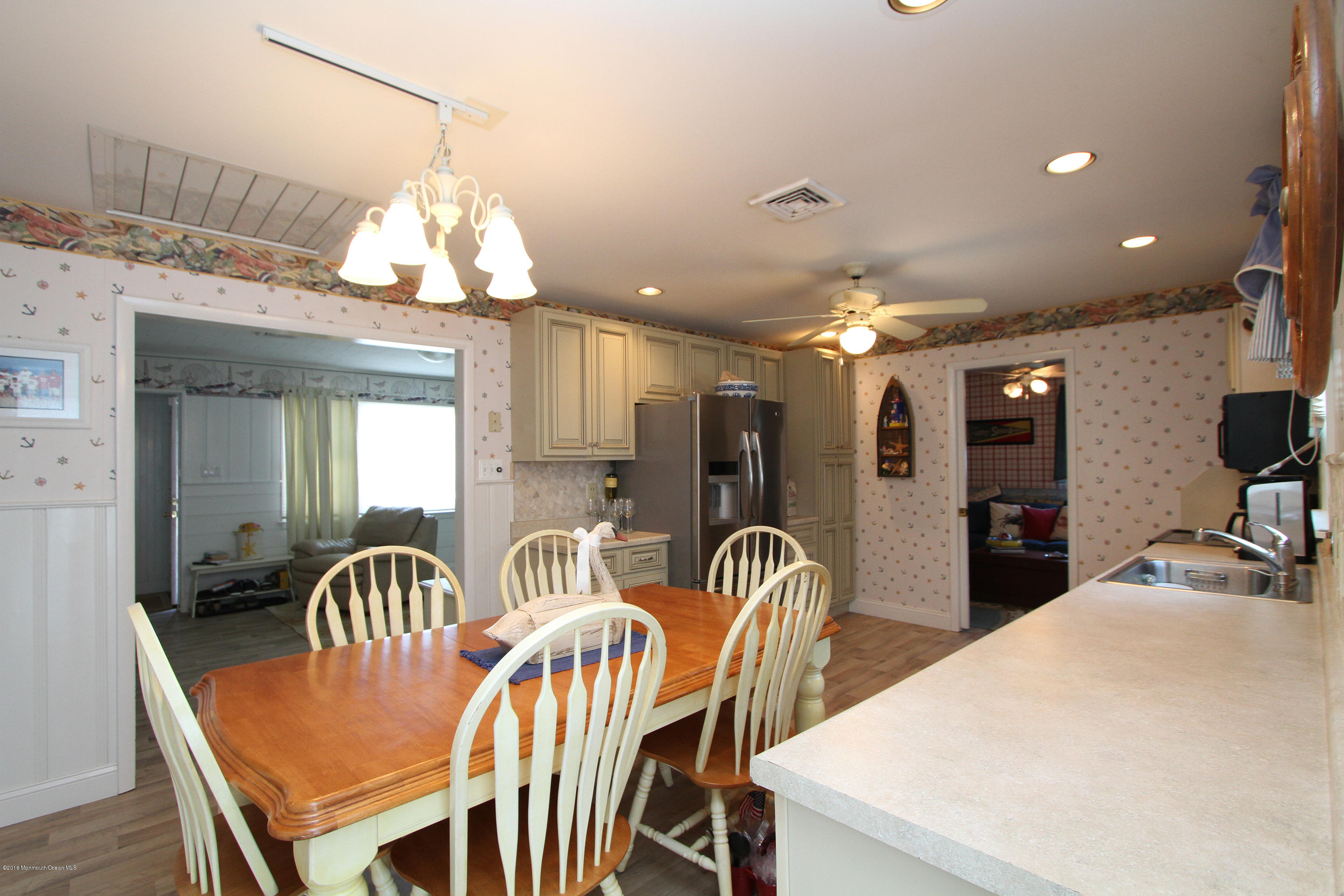 37 Silver Beach Road Lavallette, NJ 08735 - Photo 4 of 33 a view of a dining room with furniture