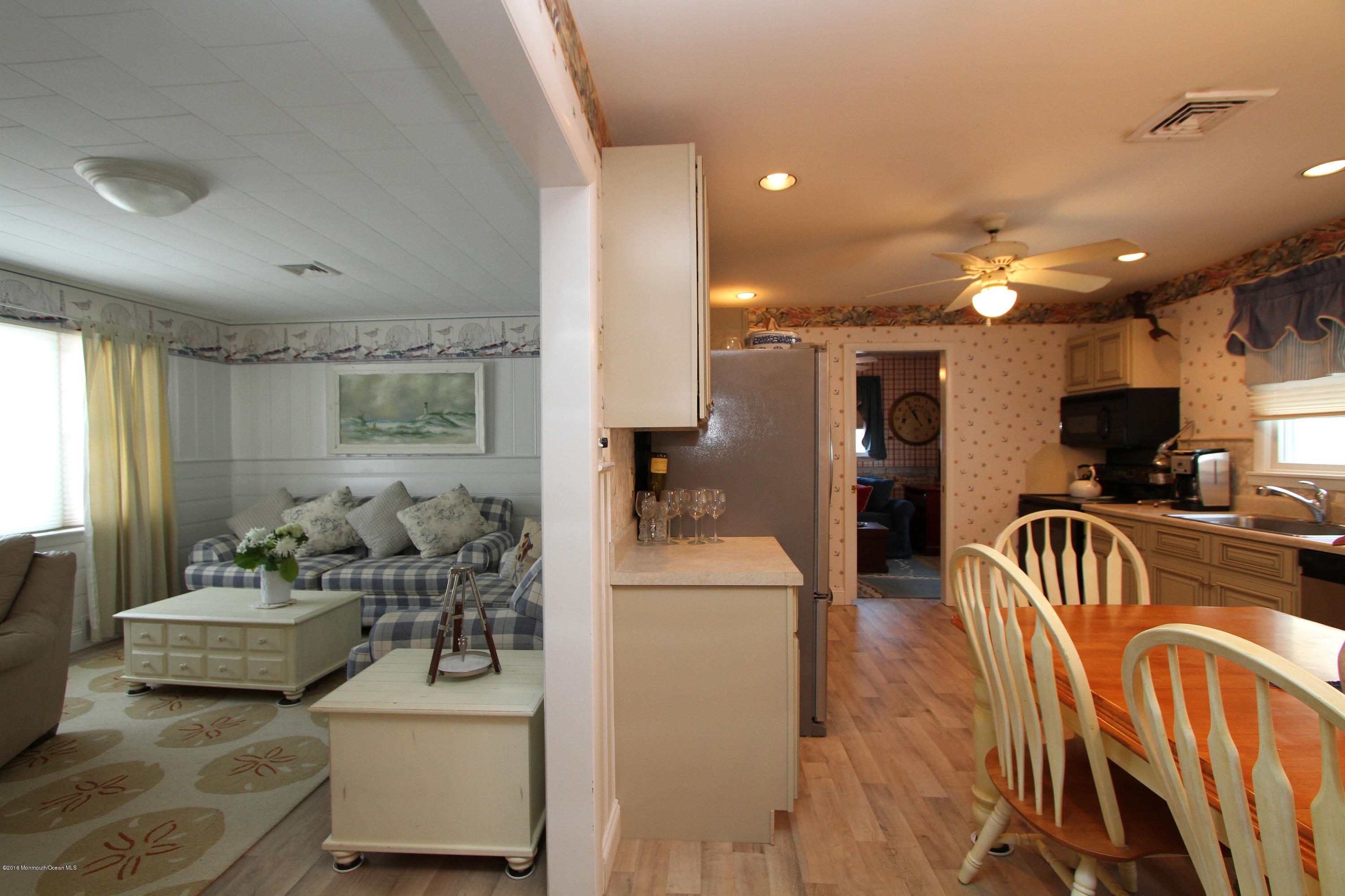 37 Silver Beach Road Lavallette, NJ 08735 - Photo 5 of 33 a living room with furniture and a flat screen tv