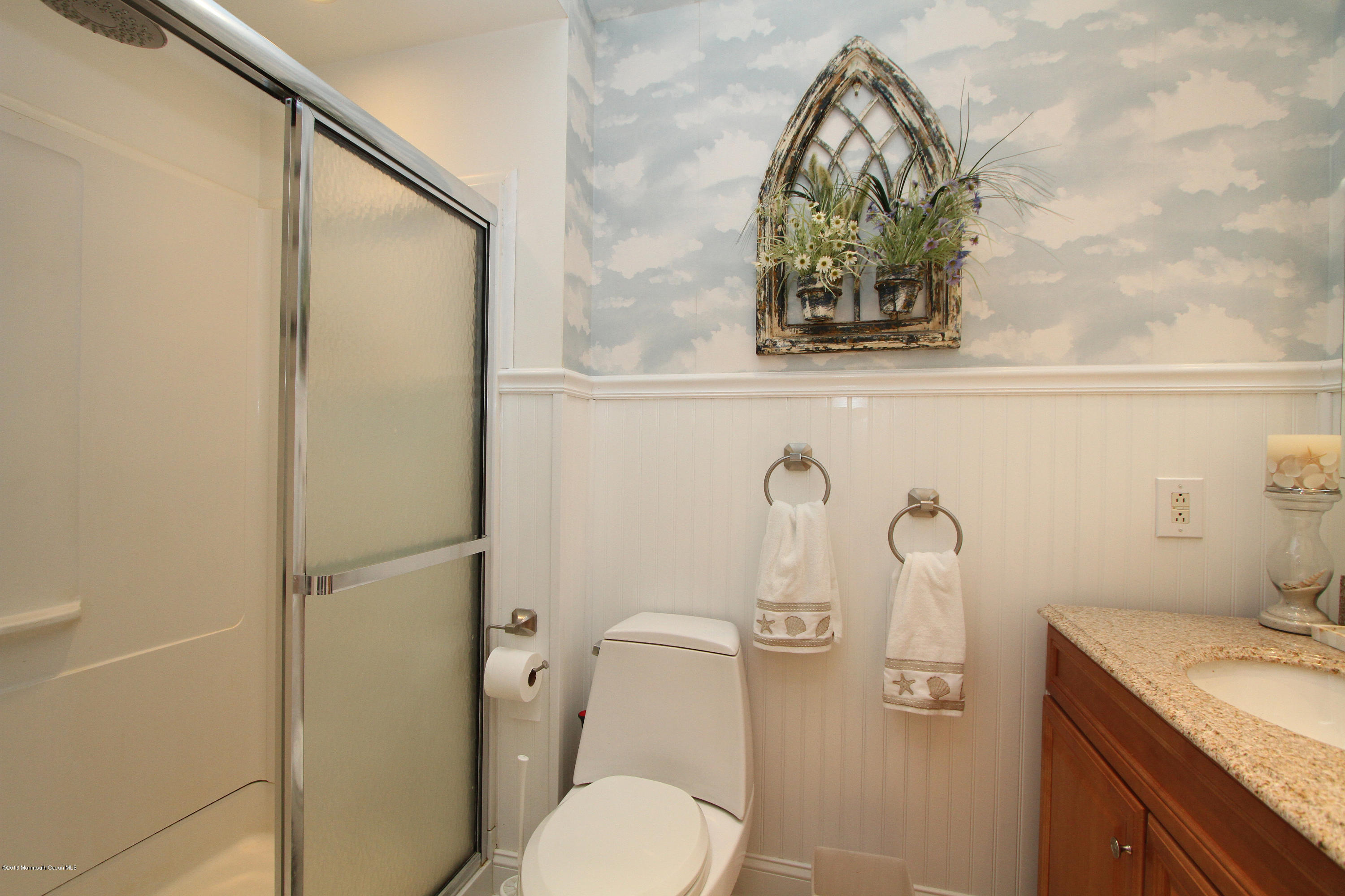 37 Silver Beach Road Lavallette, NJ 08735 - Photo 10 of 33 a bathroom with a toilet and a sink