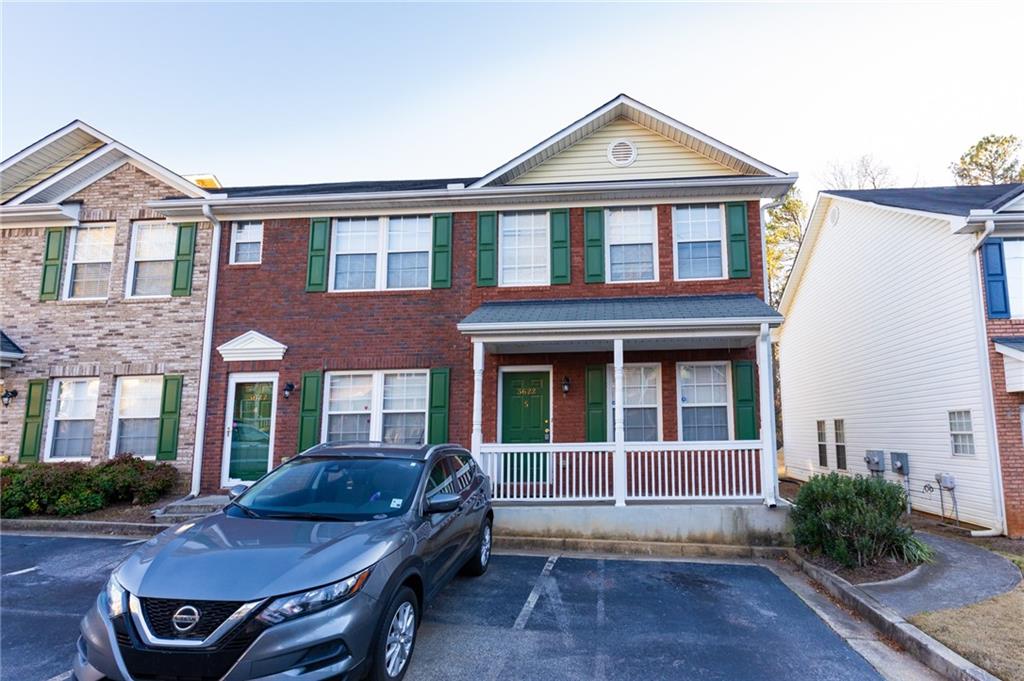 a front view of a house with yard