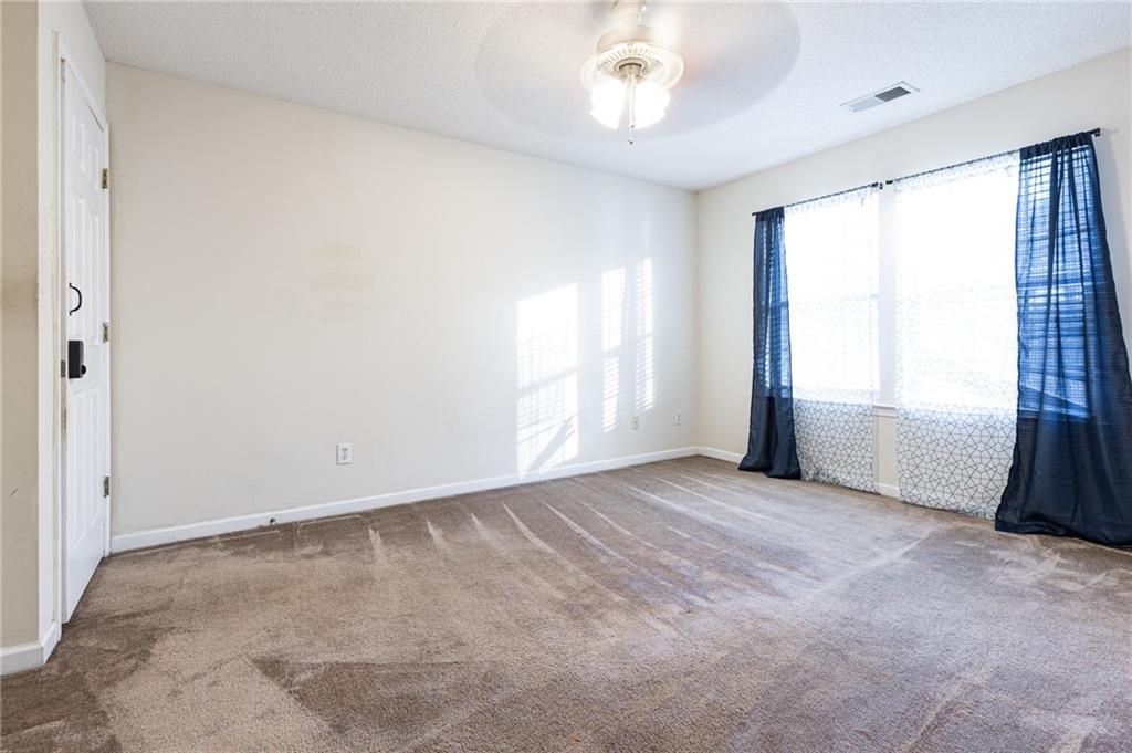 3622 Ginnis Road, Unit 5 Atlanta, GA 30331 - Photo 20 of 29 an empty room with windows