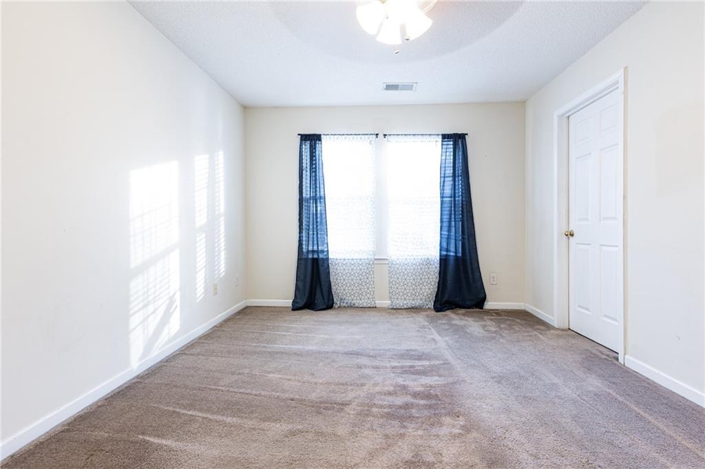 3622 Ginnis Road, Unit 5 Atlanta, GA 30331 - Photo 21 of 29 an empty room with windows