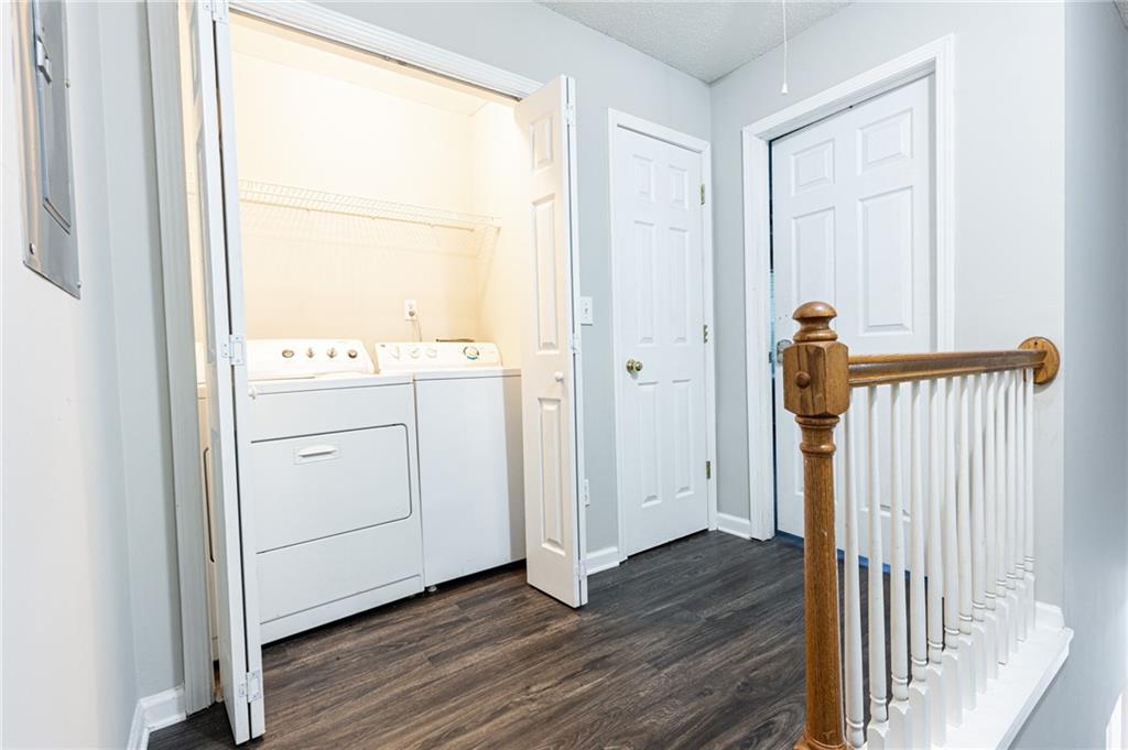 3622 Ginnis Road, Unit 5 Atlanta, GA 30331 - Photo 22 of 29 a view of a hallway with wooden floor and closet