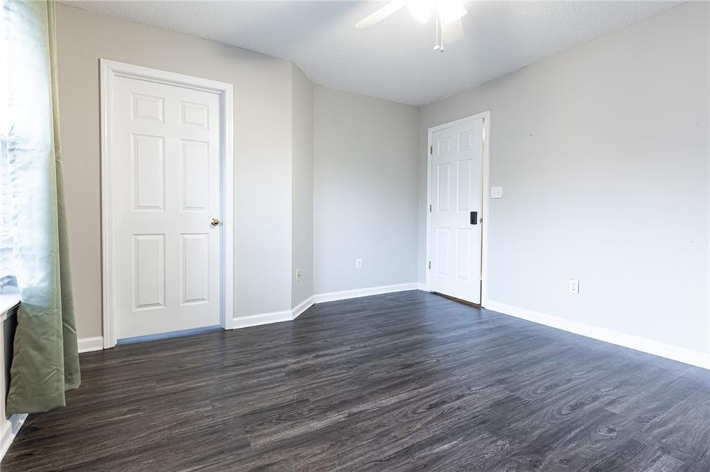 3622 Ginnis Road, Unit 5 Atlanta, GA 30331 - Photo 24 of 29 a view of an empty room with wooden floor