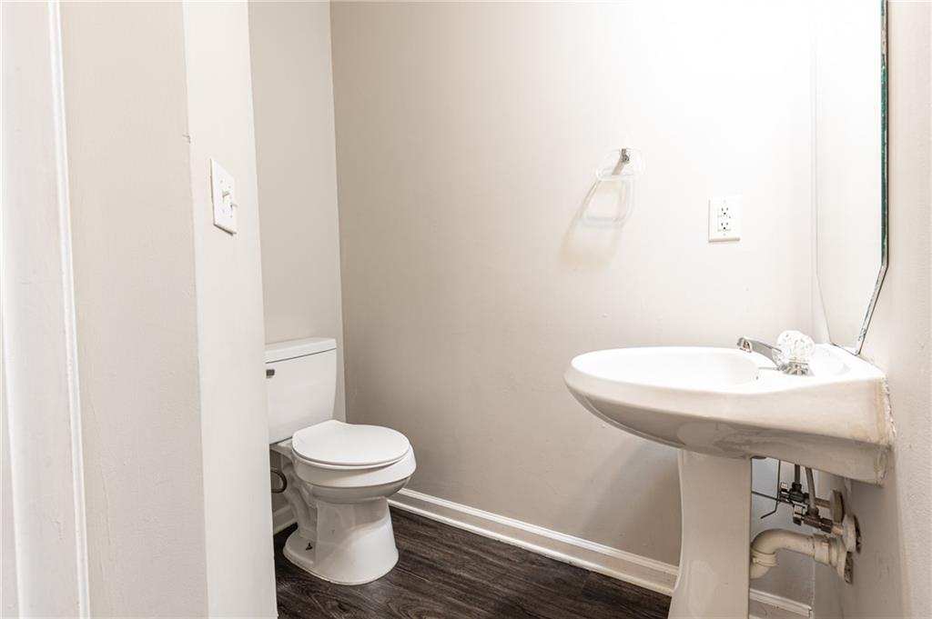 3622 Ginnis Road, Unit 5 Atlanta, GA 30331 - Photo 9 of 29 a bathroom with a sink and a toilet