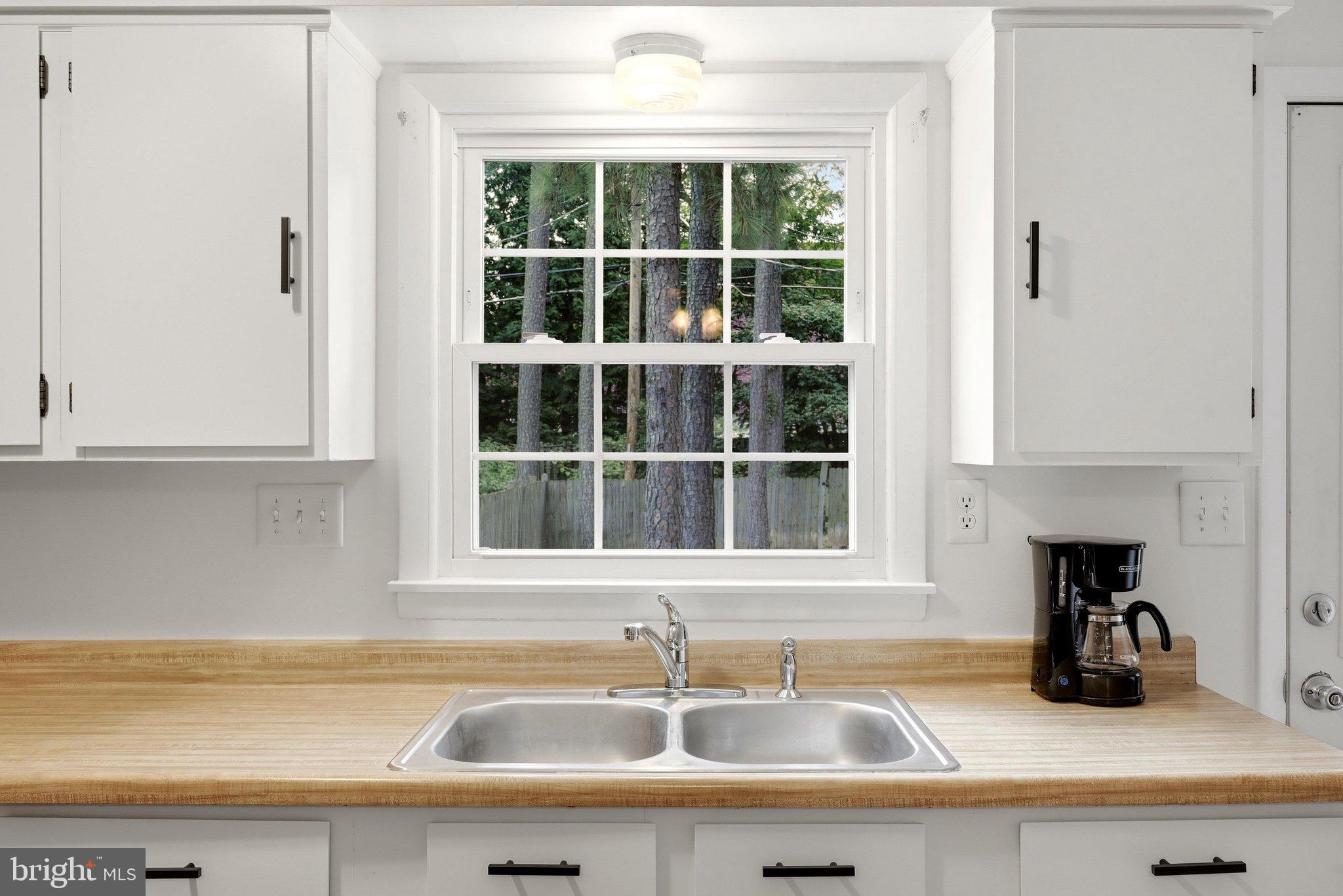 137 Brunswick Road Stephens City, VA 22655 - Photo 9 of 28 Bright kitchen with serene woodland view.