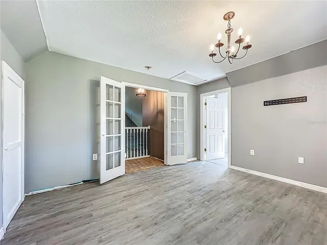 a view of a livingroom with wooden floor