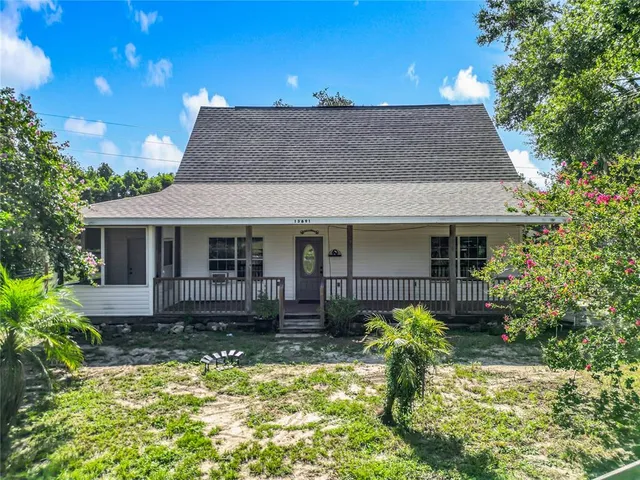 a front view of a house with a porch
