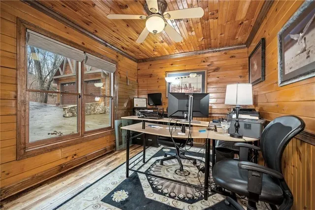 a view of a patio with table and chairs