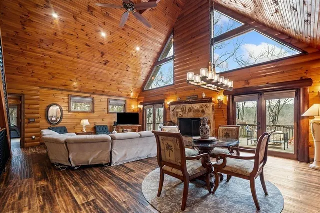 a living room with furniture and a rug