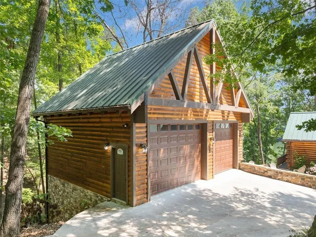 a view of a lake with houses in the back