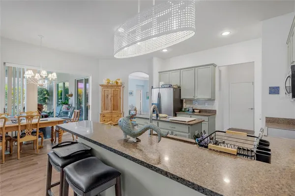 a room with lots of furniture and windows