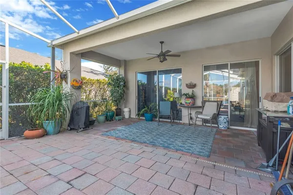 a view of a porch with seating space