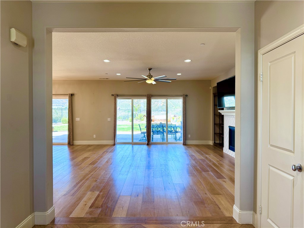 17841 Grapevine Lane San Bernardino, CA 92407 - Photo 13 of 63 wooden floor in an empty room with a window