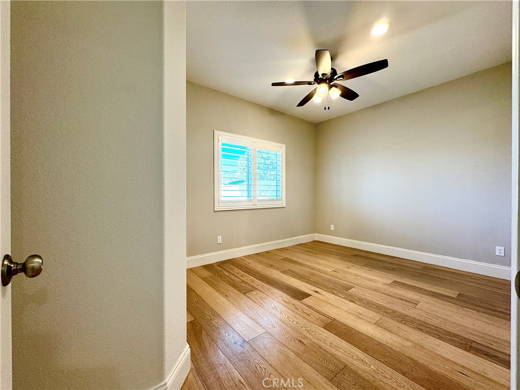 17841 Grapevine Lane San Bernardino, CA 92407 - Photo 26 of 63 an empty room with windows and fan