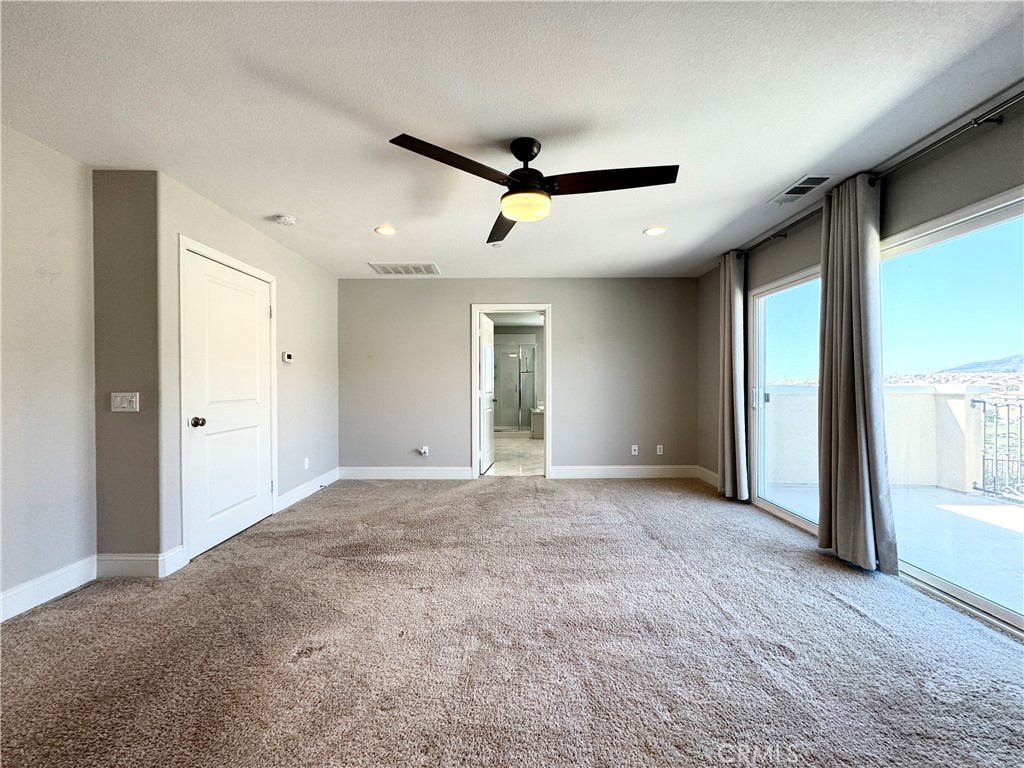 17841 Grapevine Lane San Bernardino, CA 92407 - Photo 43 of 63 a view of an empty room with a window