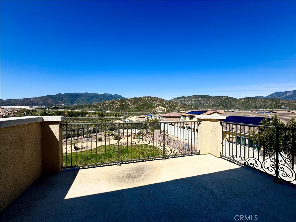 17841 Grapevine Lane San Bernardino, CA 92407 - Photo 49 of 63 a view of a balcony with wooden floor