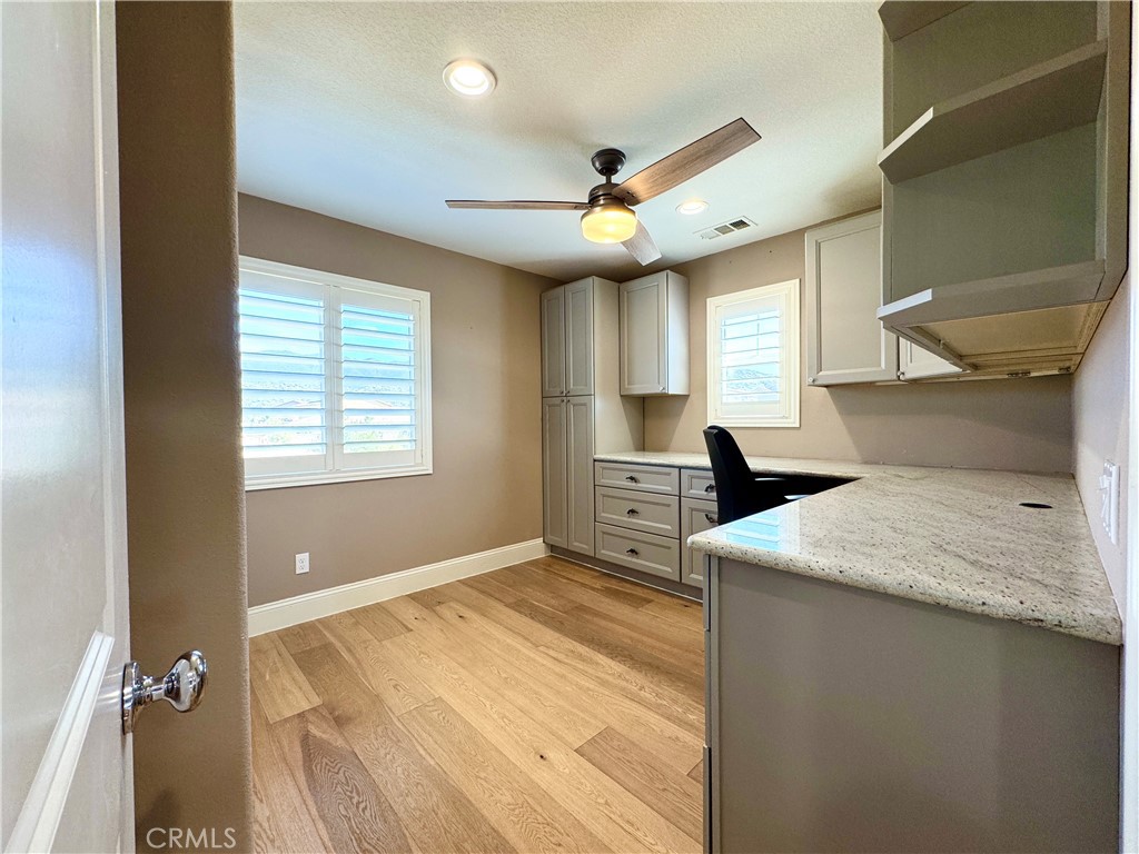 17841 Grapevine Lane San Bernardino, CA 92407 - Photo 50 of 63 a bedroom with a bed and a large window