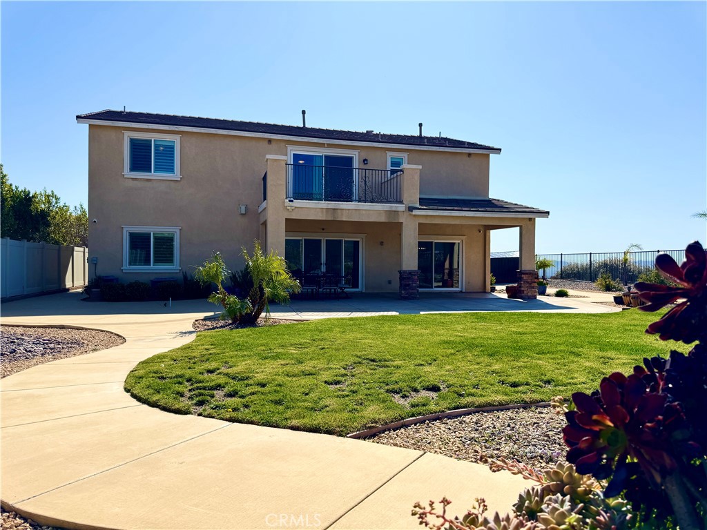 17841 Grapevine Lane San Bernardino, CA 92407 - Photo 5 of 63 a view of a house with a garden