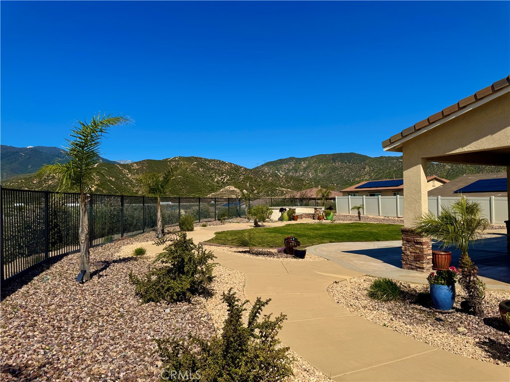 17841 Grapevine Lane San Bernardino, CA 92407 - Photo 6 of 63 a view of a house with a yard