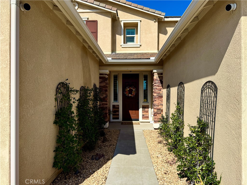 17841 Grapevine Lane San Bernardino, CA 92407 - Photo 10 of 63 a view of a entryway door of the house
