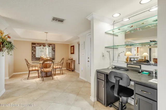 a workspace with furniture and window