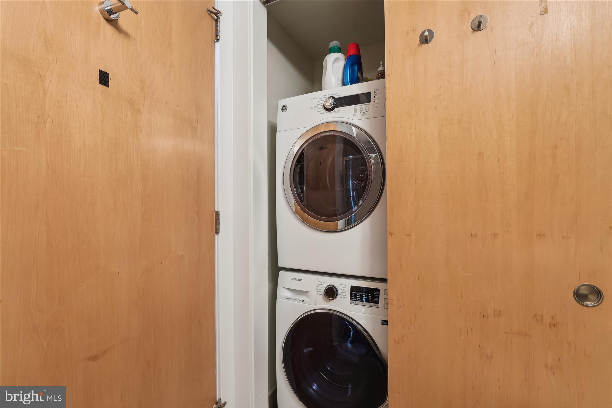 1133 14th Street Northwest, Unit 1209 Washington, DC 20005 - Photo 21 of 42 a utility room with dryer and washer