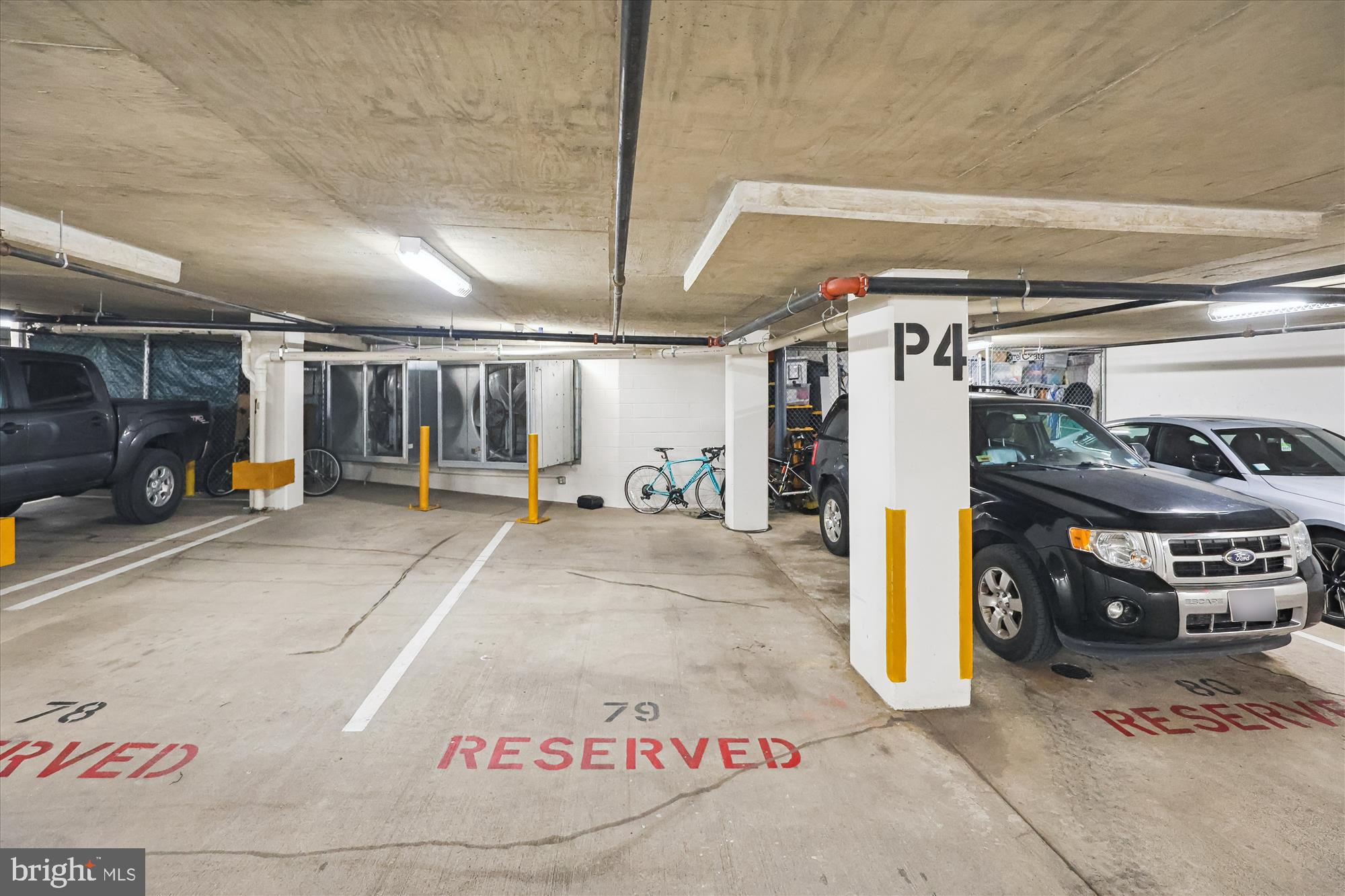 1133 14th Street Northwest, Unit 1209 Washington, DC 20005 - Photo 23 of 42 a view of parking garage with cars