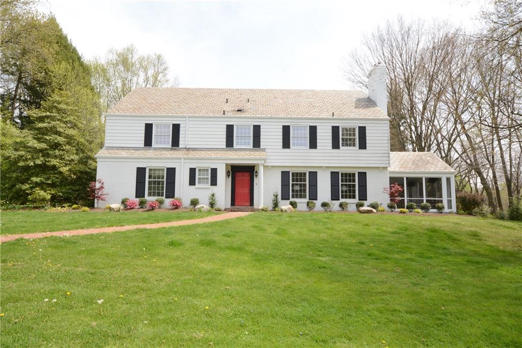 Well maintained brick Colonial. 