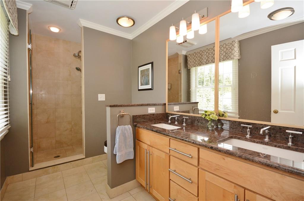 104 Hawthorne Road Fox Chapel, PA 15238 - Photo 14 of 24 Updated master bathroom with granite sinks and step in shower.