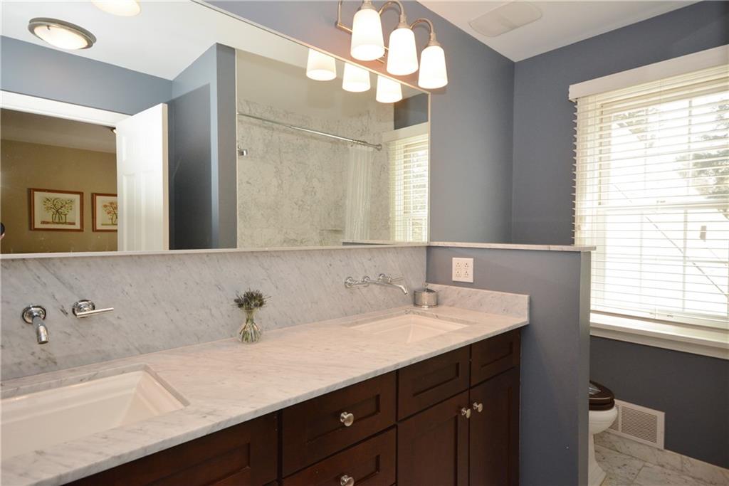 104 Hawthorne Road Fox Chapel, PA 15238 - Photo 16 of 24 Marble sinks in hall bathroom.