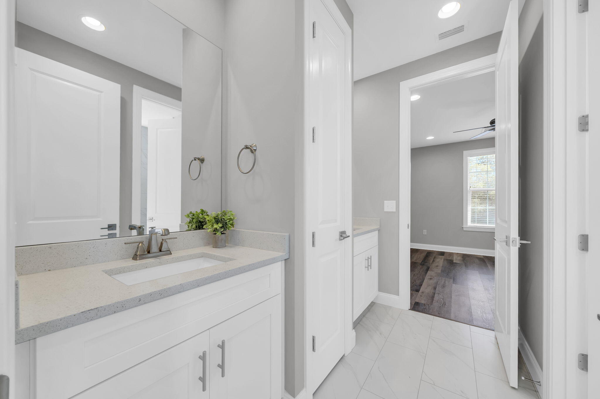 304 Windrow Way Inlet Beach Inlet Beach, FL 32461 - Photo 33 of 70 a bathroom with a sink and a mirror