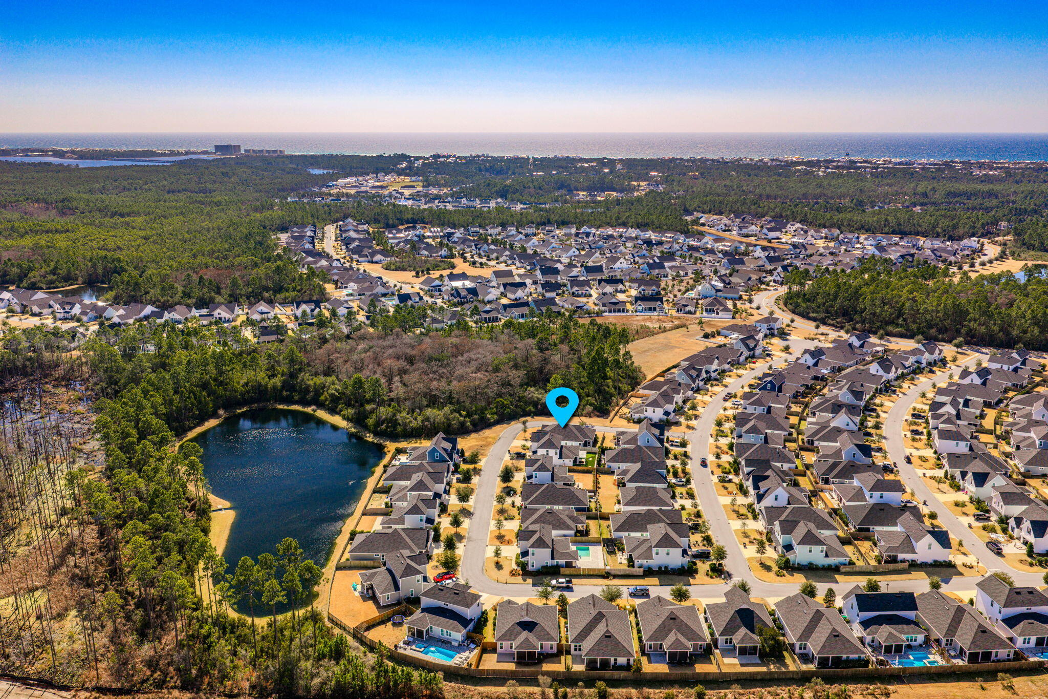 304 Windrow Way Inlet Beach Inlet Beach, FL 32461 - Photo 50 of 70 an aerial view of a house with a lake view