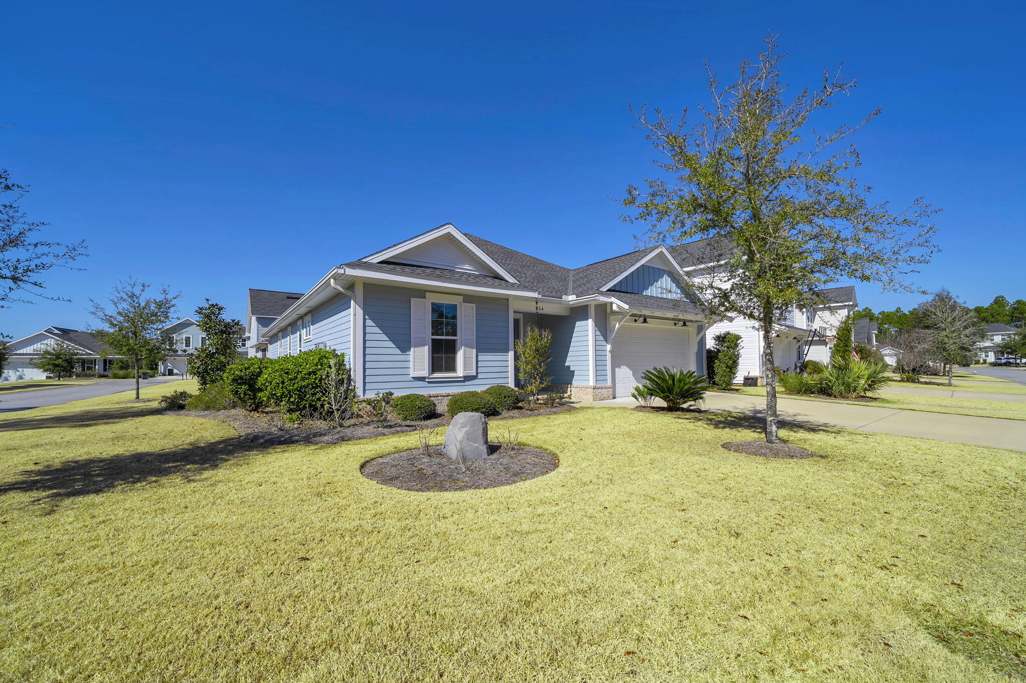 304 Windrow Way Inlet Beach Inlet Beach, FL 32461 - Photo 7 of 70 a front view of a house with swimming pool and porch