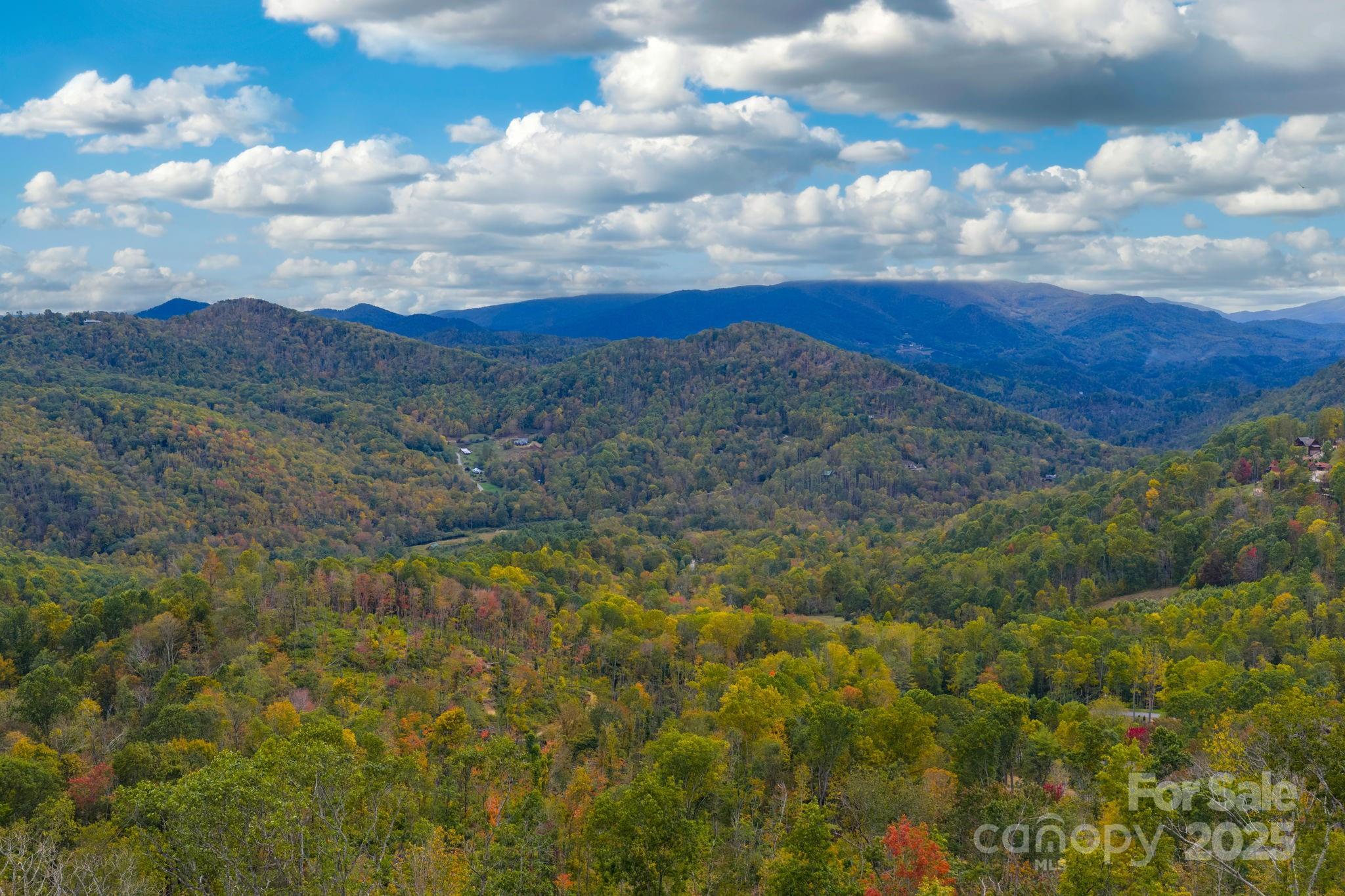 G-66 White Eagle Trail, Unit G66 Banner Elk, NC 28604 - Photo 1 of 24 a view of a city and mountains